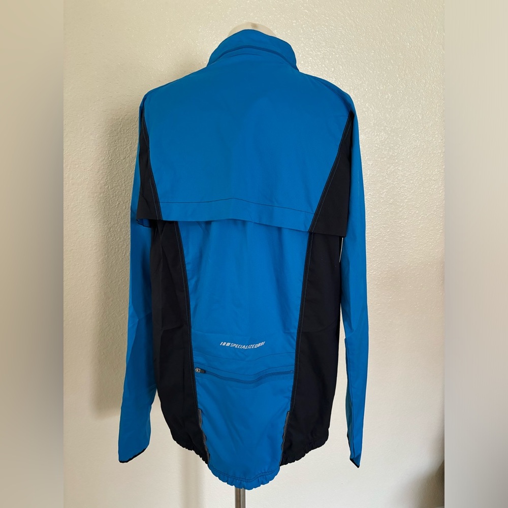 Specialized windbreaker jacket with zip away sleeves